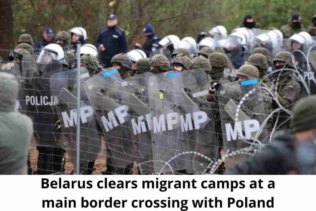 Belarus clears migrant camps at a main border crossing with Poland